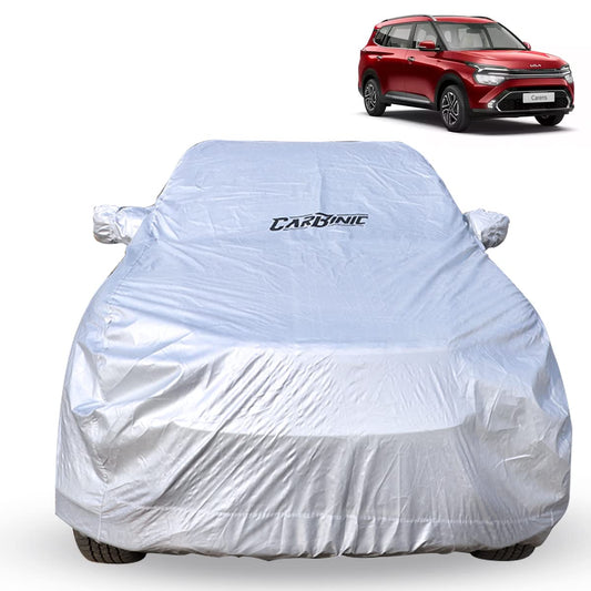 CarBinic Car Cover for KIA Carens 2022: Waterproof, Dustproof, UV Heat Resistant, Triple Stitched, Fully Elastic, Silver with Pockets.