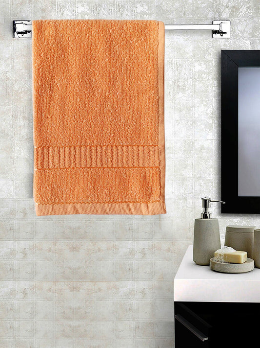 Orange Hand Towel Set of 6 Solid Popcorn Weave Plain Cotton Crepe Design with track Border Soft Small Basic Size 35x50 cms Premium 400 GSM Absorbant Towels by Lushomes