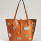 Travel Patches Embroidered Tote Tan